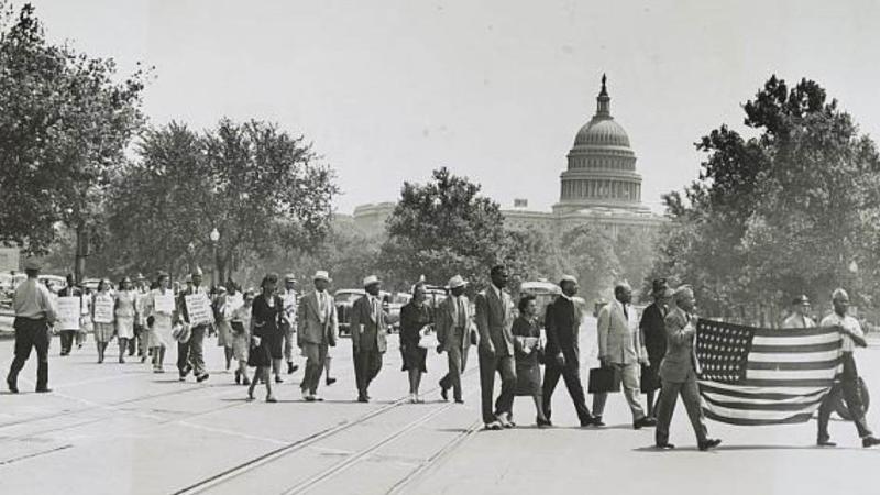 Group of African-Americans, marching near the Capitol building in Washington, D.C., to protest the lynching of four African-Americans in Georgia, 1946 (Library of Congress
