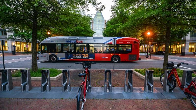 Photo of Metro bus and Capital Bikeshare Corral in the Carlyle area of Alexandria