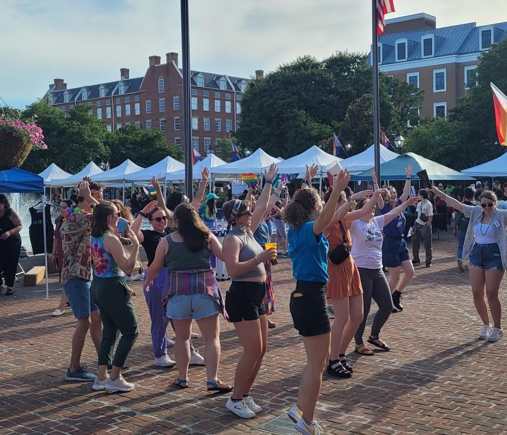 People dancing at pride fair