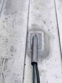 Electrical sleeve on metal roof