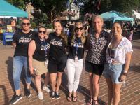 People wearing Alexandria Pride t-shirts posing