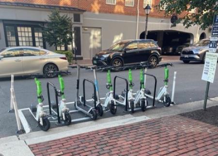 Scooters in a parking corral