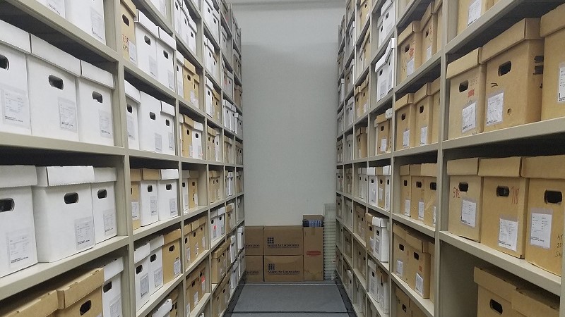 Boxes on compactor shelving in Archaeology Collections Storage Facility