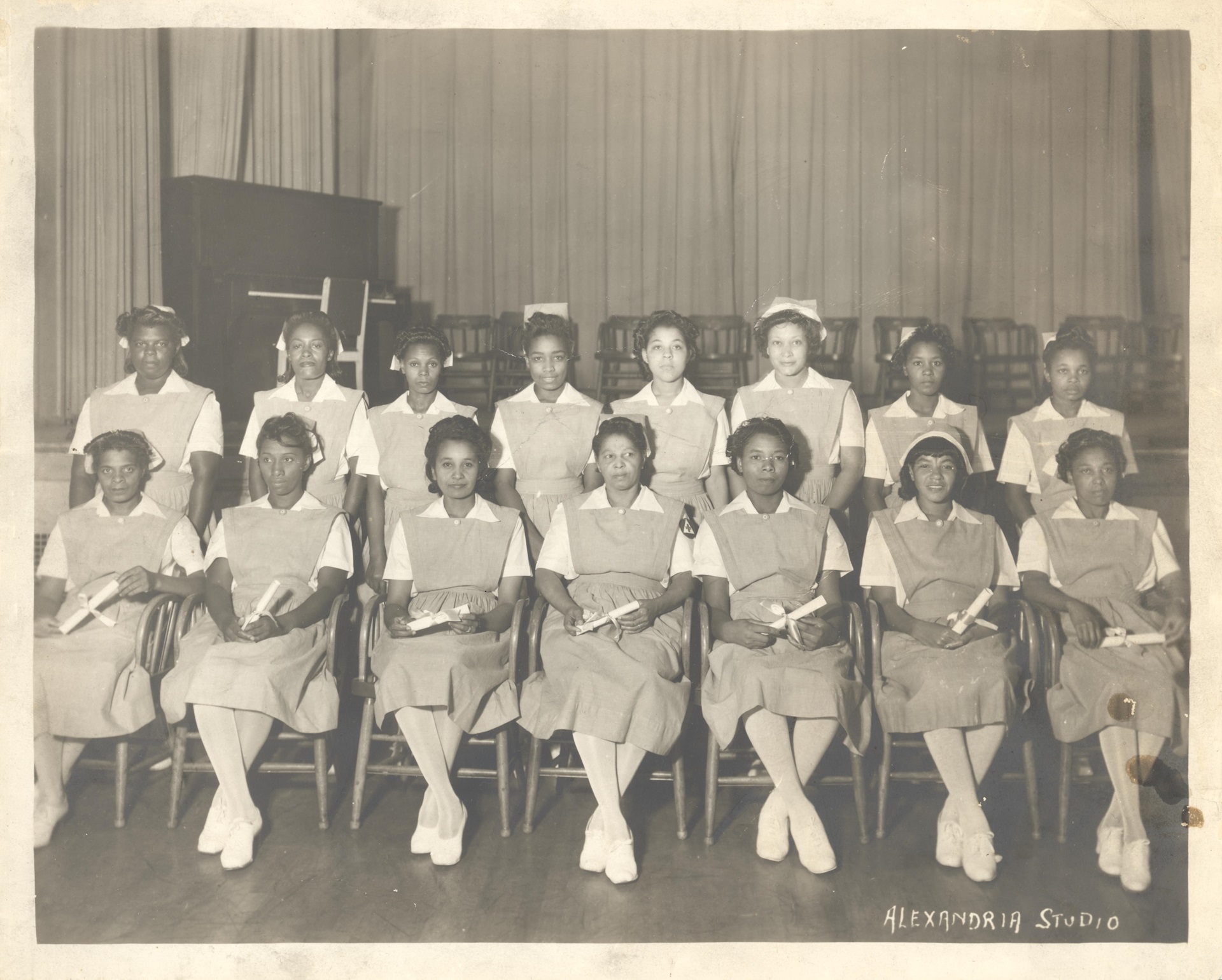 African American nurses aides seated in three rows