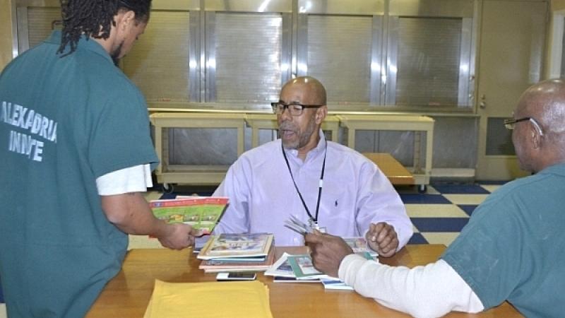 volunteer assisting inmates at jail