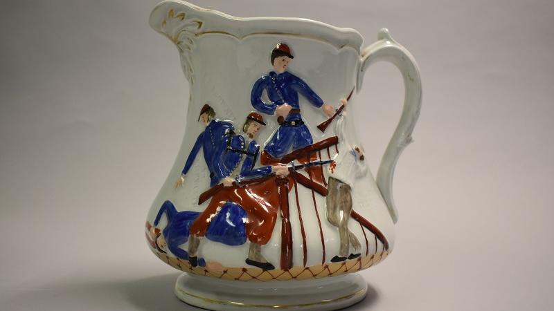 Whiteware pitcher depicting the Ellsworth Incident