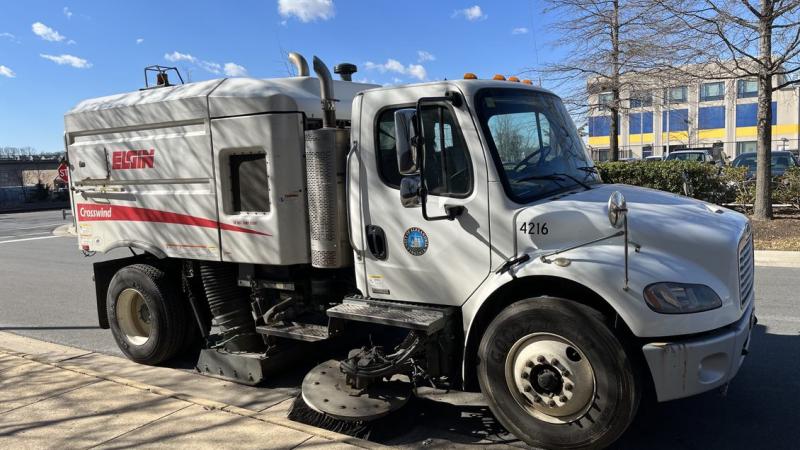 A TES street sweeping vehicle cleaning a city street