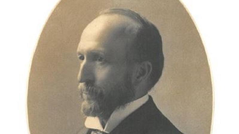 Portrait, facing left, black and white image