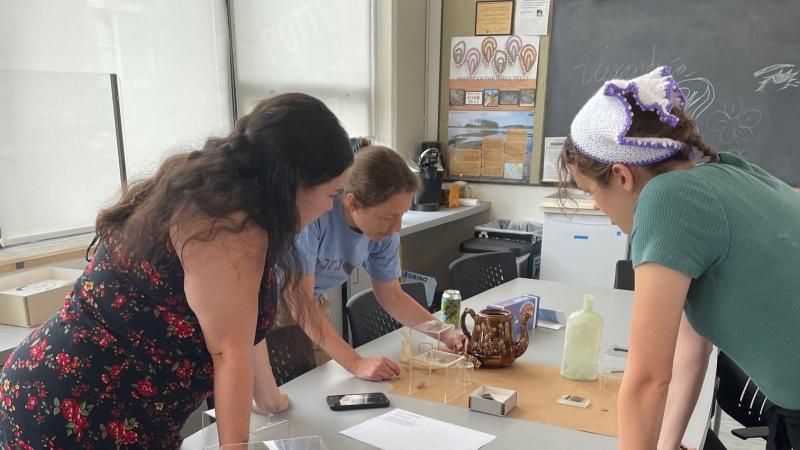 Interns working on exhibit.