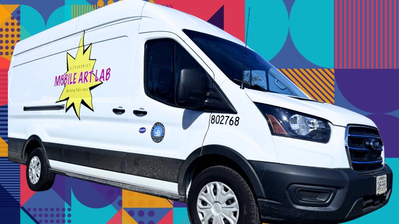 White mobile art lab van with the MAL and the COA logos on the side on a colorful background