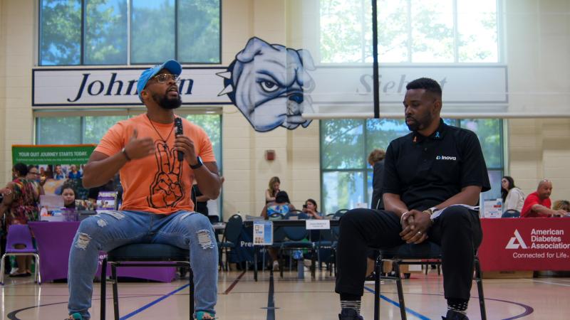 Two men in conversation