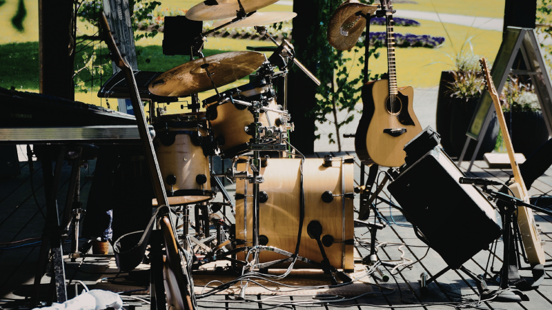 Band instruments on stage with the sunlight on it