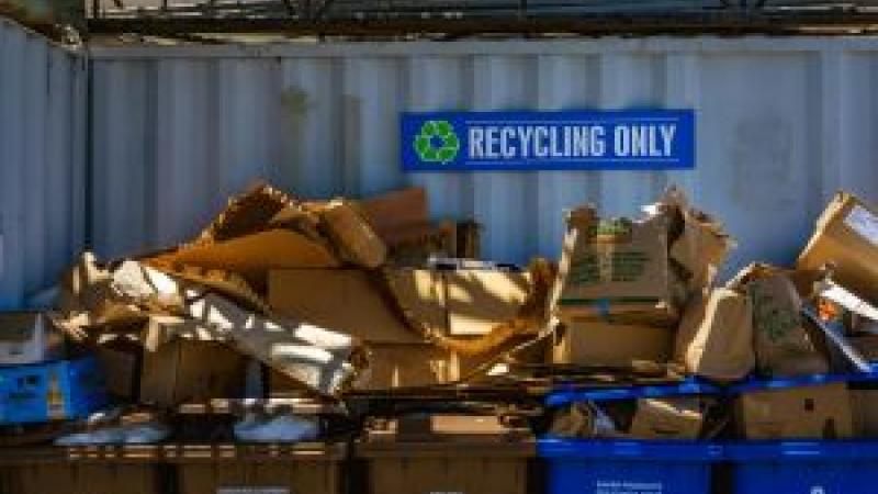 Garbage Containers with Recycling Only Sign