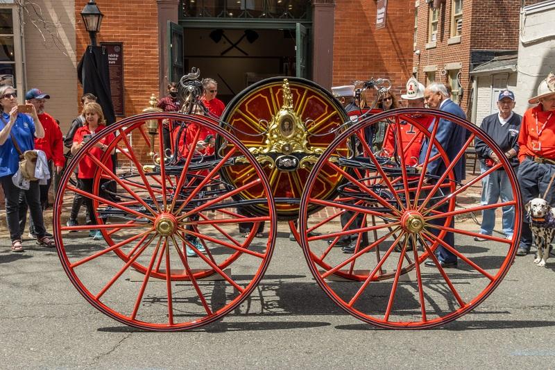 Hose Reel Carriage in front of Friendship Firehouse Museum