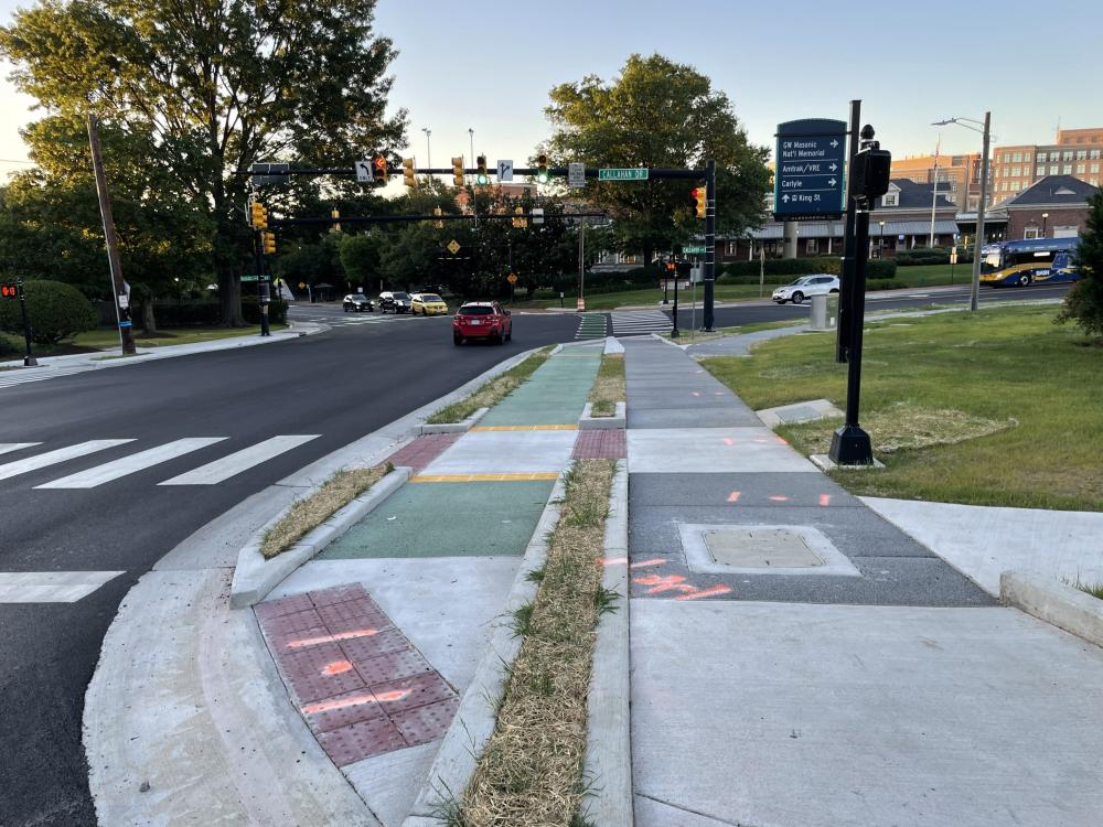 A photo of the new sidewalk and bike lane at the King/Callahan/Russell intersection