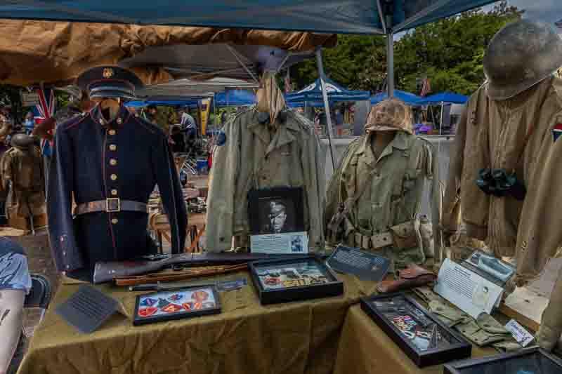 Exhibit table with uniforms