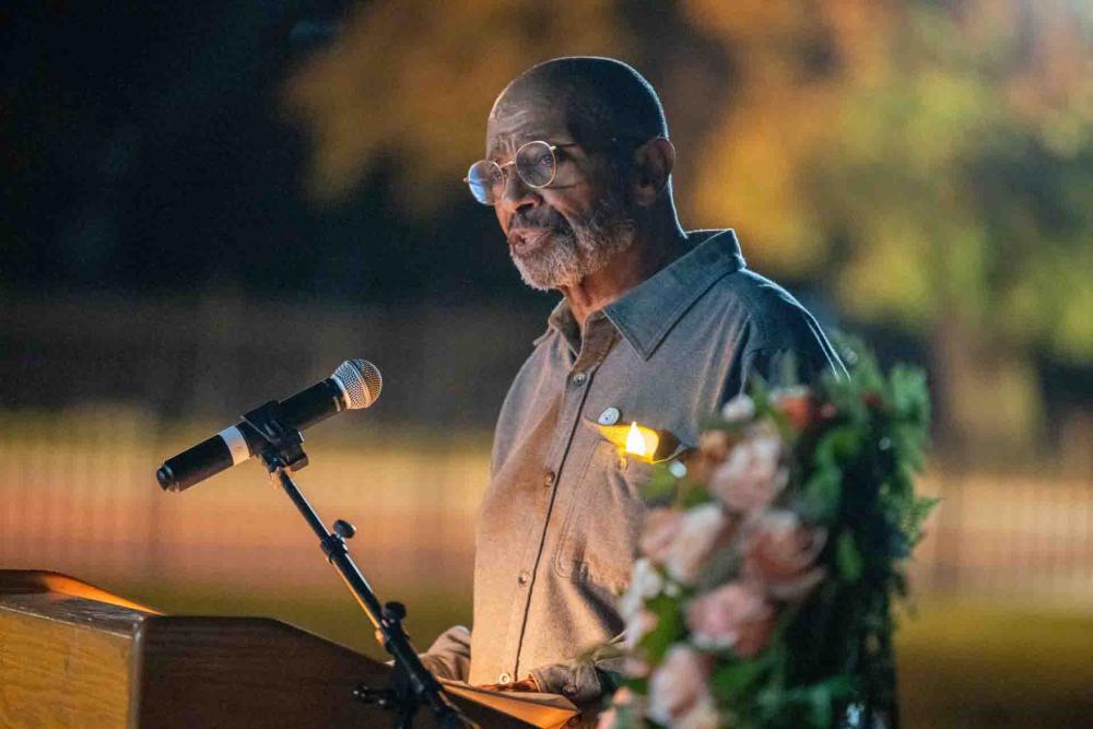 Speaker Eugene Thompson at podium