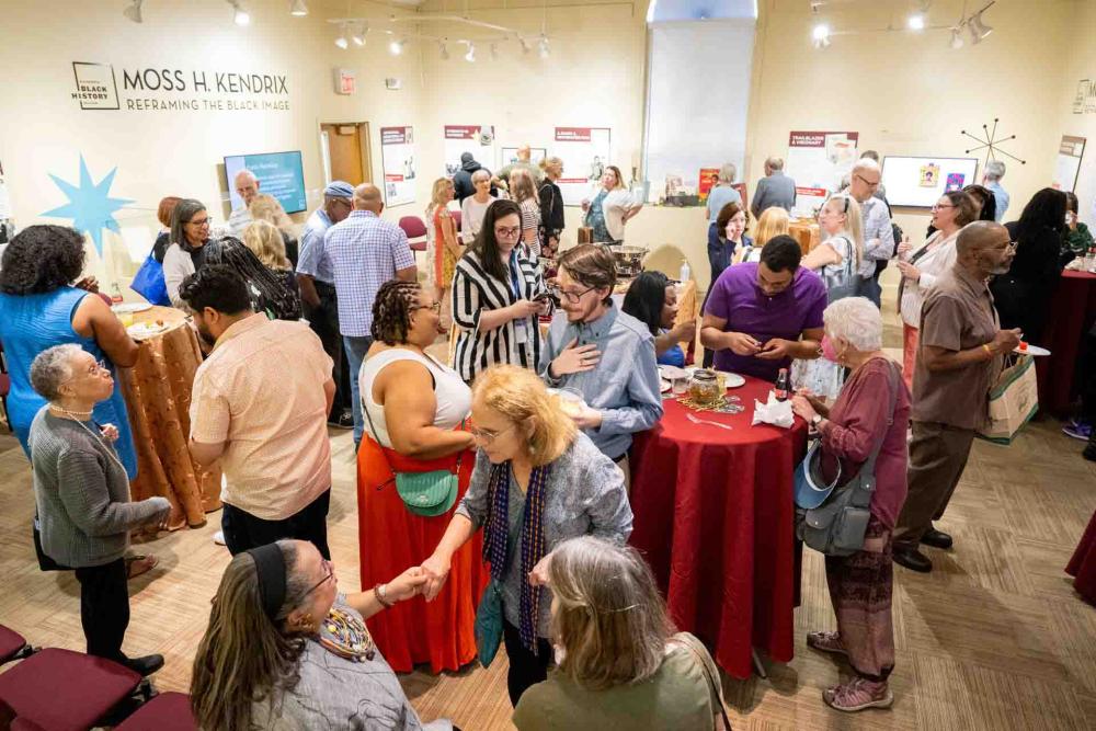 Crowd at exhibit opening