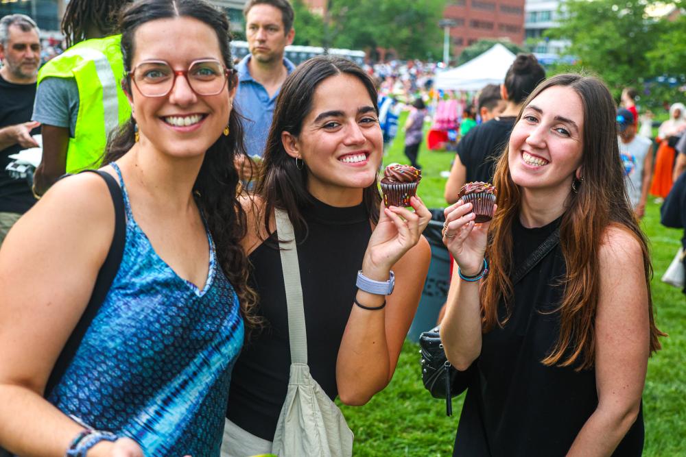 A group of friends enjoying cupcakes