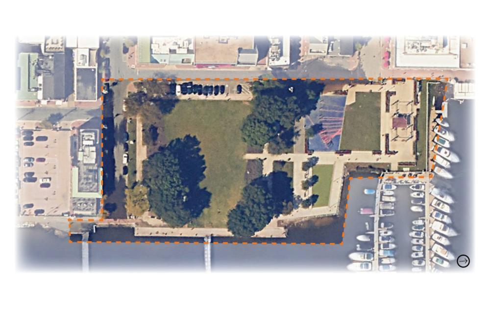 Birds-eye view of Waterfront Park, with the boundary outlined in an orange dashed line.