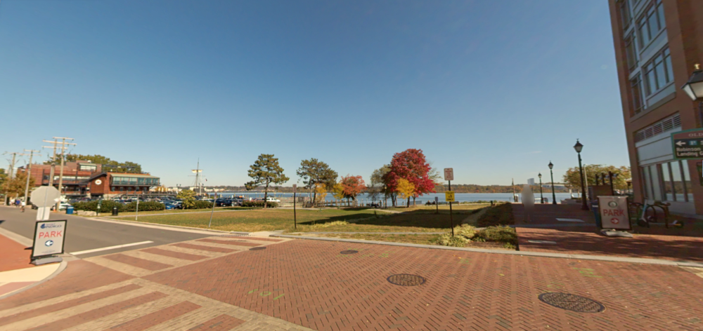 Photo of the street level view of the Waterfront from the intersection of Strand St. and Duke St. facing the water (northeast).