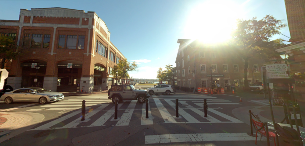Street-level view of the unit block of King Street from the 100 block of King Street.