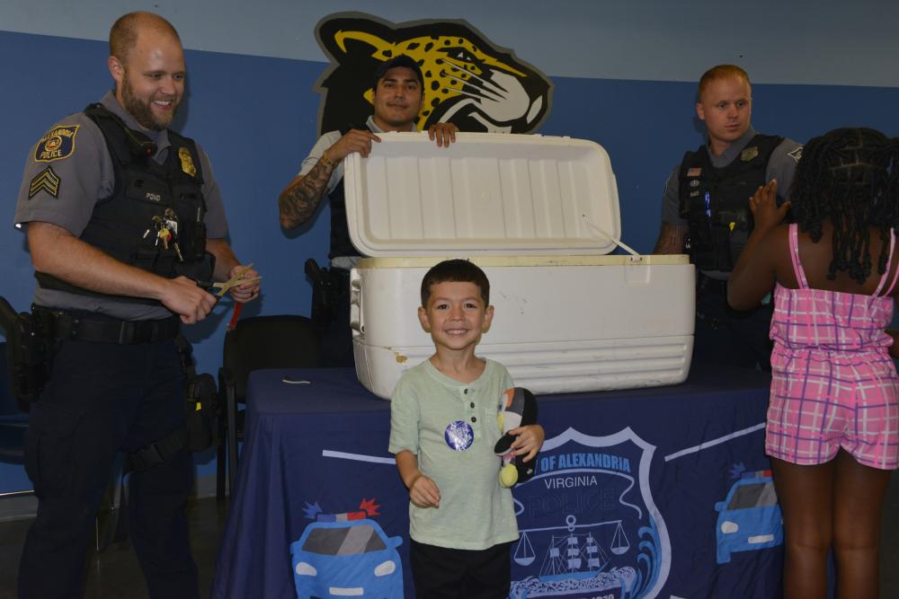 APD officers connected with students and families during Back to School Popsicle on August 26, 2025, promoting safety and community engagement as the school year began.