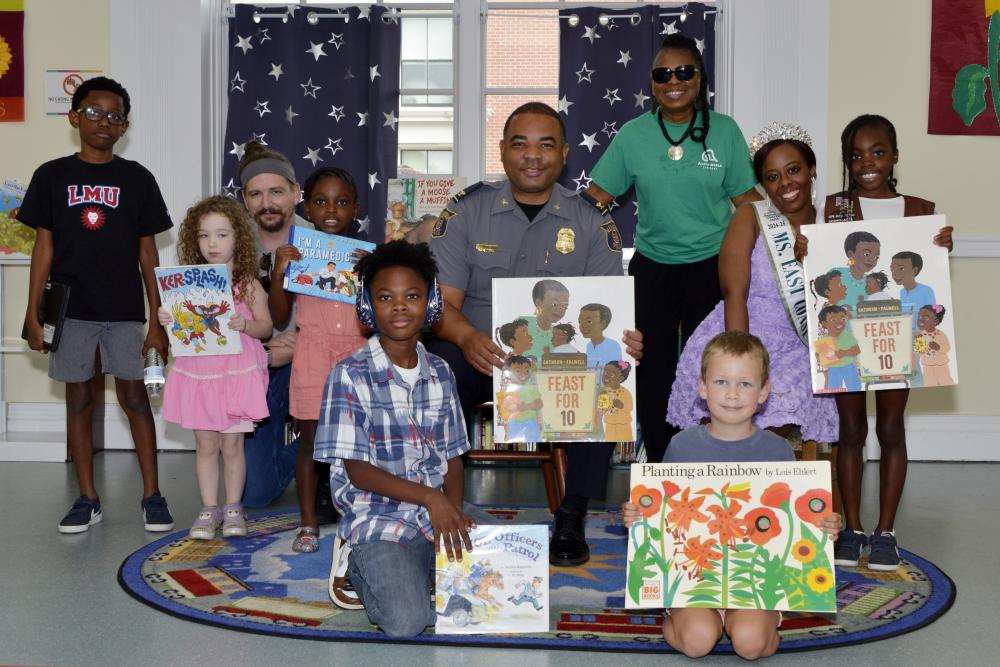 Chief Tarrick McGuire joined families and young readers at the Alexandria Library’s Black Family Reunion on September 6, 2025 — celebrating community, culture, and connection through the joy of reading.