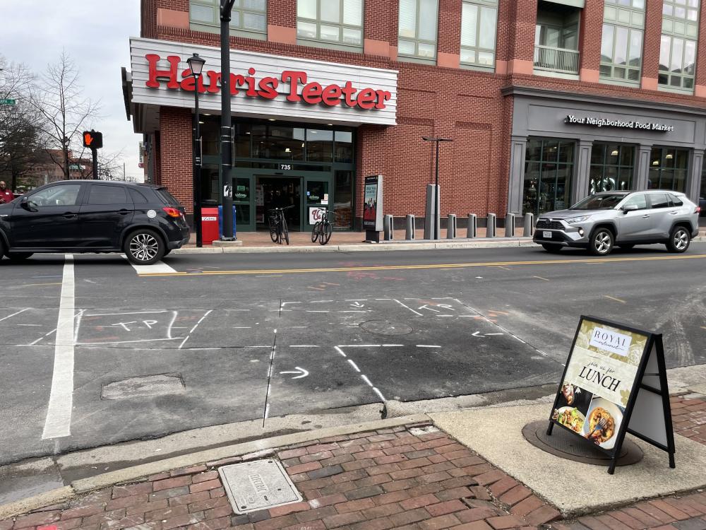 Photo of test pit, excavation, and project extent markings on N. St. Asaph St.