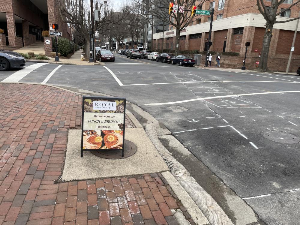Photo of test pit and excavation markings in the intersection at Madison St. and N. St. Asaph St.