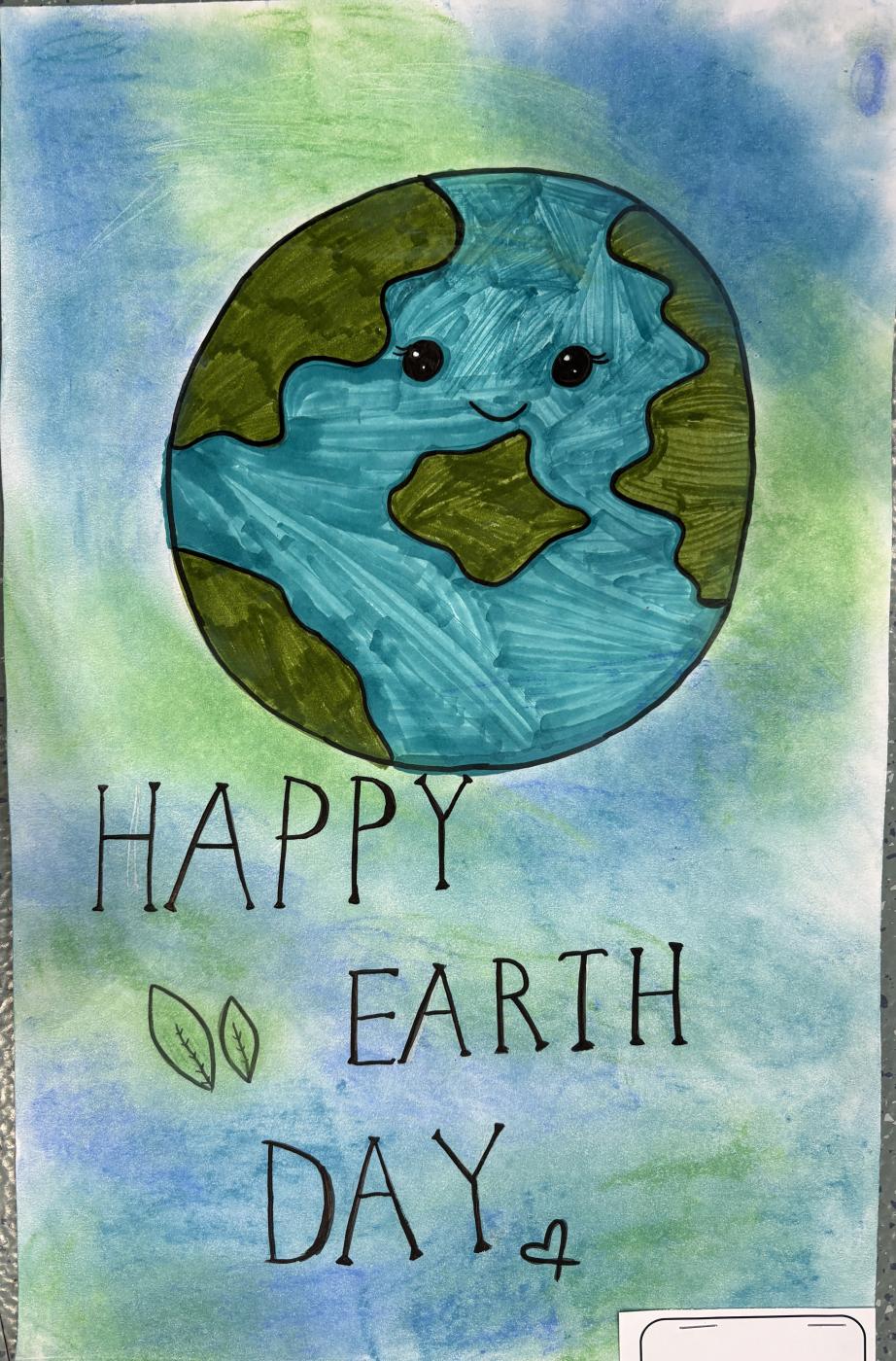 Earth with "Happy Earth Day"