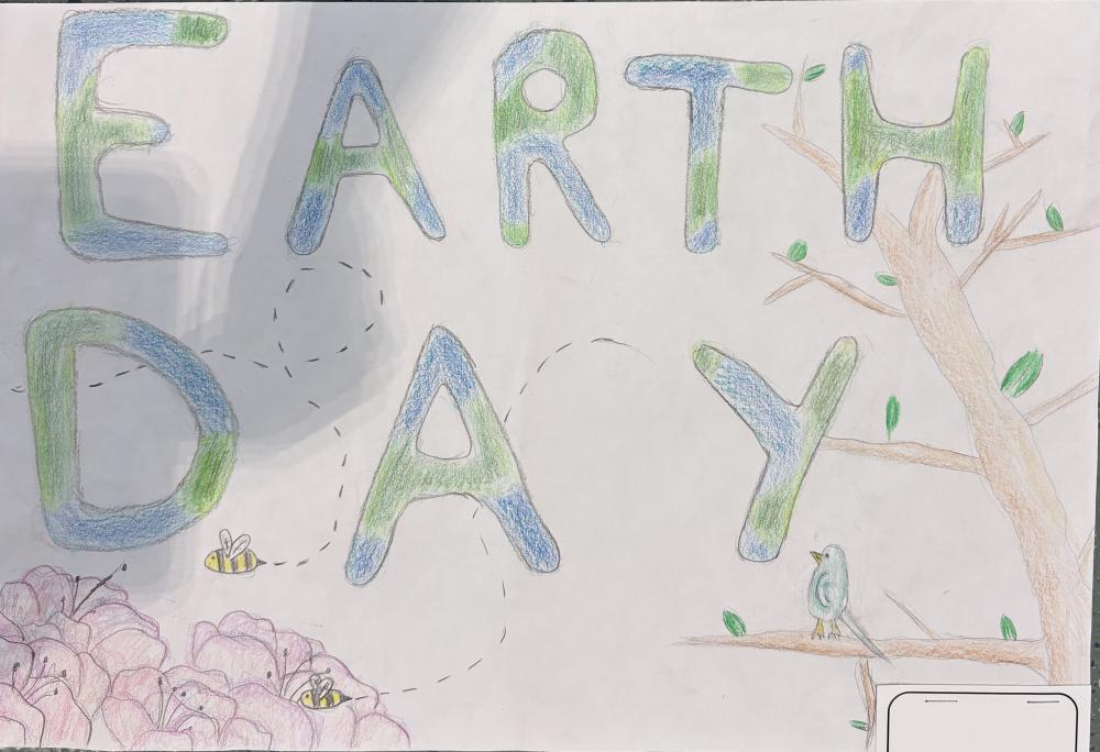 The words "Earth Day" with a tree and bird around it 