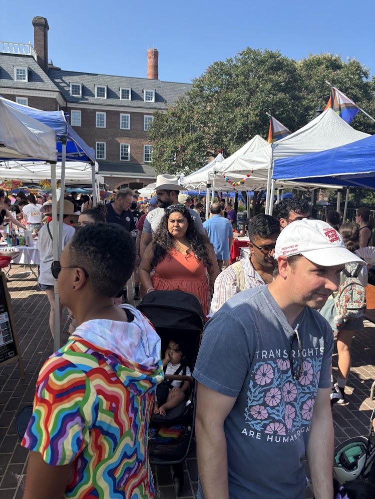 People walking between tents at Alexandria Pride 2025