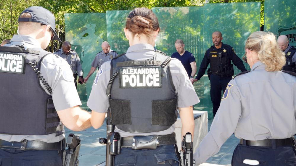 A Faith & Blue gathering brings officers together at Alexandria’s fallen officers memorial to reflect on sacrifice, service and their shared commitment to the community.
