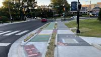 A photo of the new sidewalk and bike lane at the King/Callahan/Russell intersection