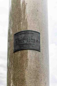 plaque on flag pole