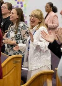 audience members applauding