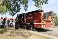 Tons of Trucks attendees checking out the fire truck