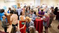 Crowd at exhibit opening