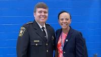 Sheriff in formal uniform and Mayor in civilian clothing, both smiling