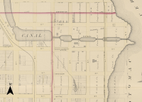 Map of Alexandria in 1877 showing the narrow locks and wider basins of the canal.