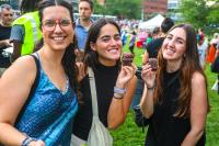 A group of friends enjoying cupcakes