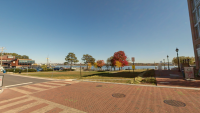 Photo of the street level view of the Waterfront from the intersection of Strand St. and Duke St. facing the water (northeast).