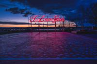 Pink I Love You in script with a dusk background