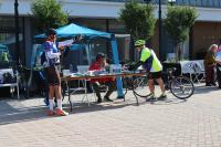 Participants engaging with vendors at the Old Town Pitstop 