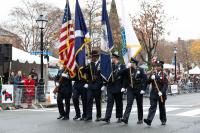 honor guard of 6 people carrying four flags