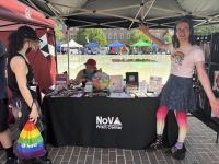 Community partner table at Alexandria Pride 2025