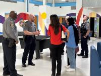 APD officers and community members get to know one another through informal conversation during a Faith & Blue gathering.