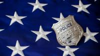 Alexandria Police Badge on Flag with Stars