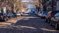 Photo of cars parked on a cobble street in Old Town